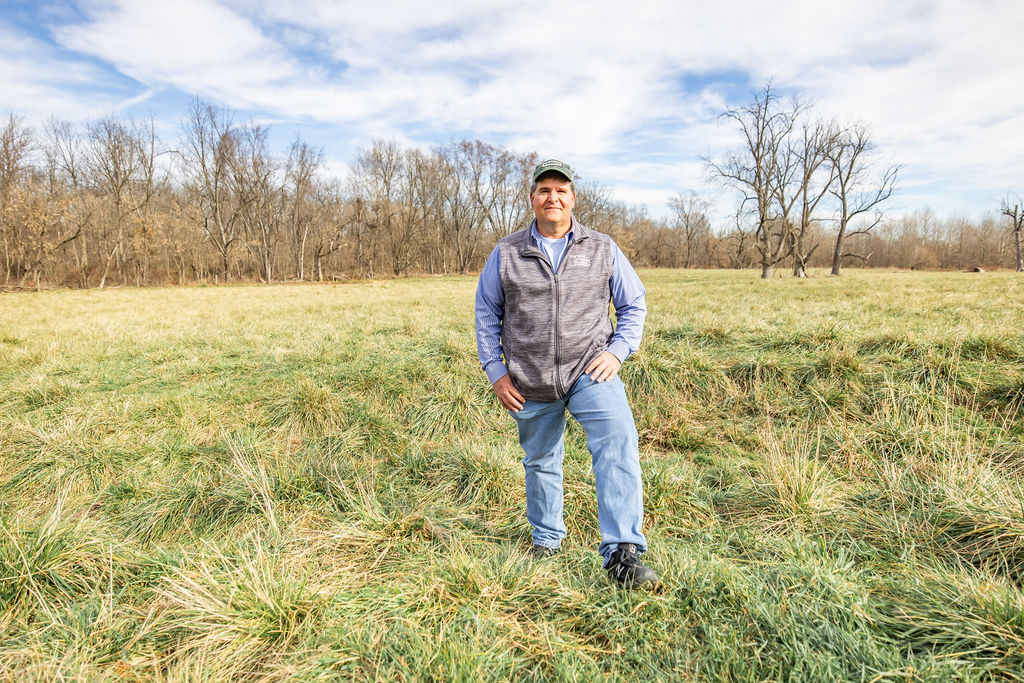 A man stands in a field